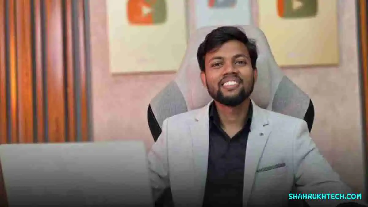 Manoj Dey smiling portrait with YouTube theme background